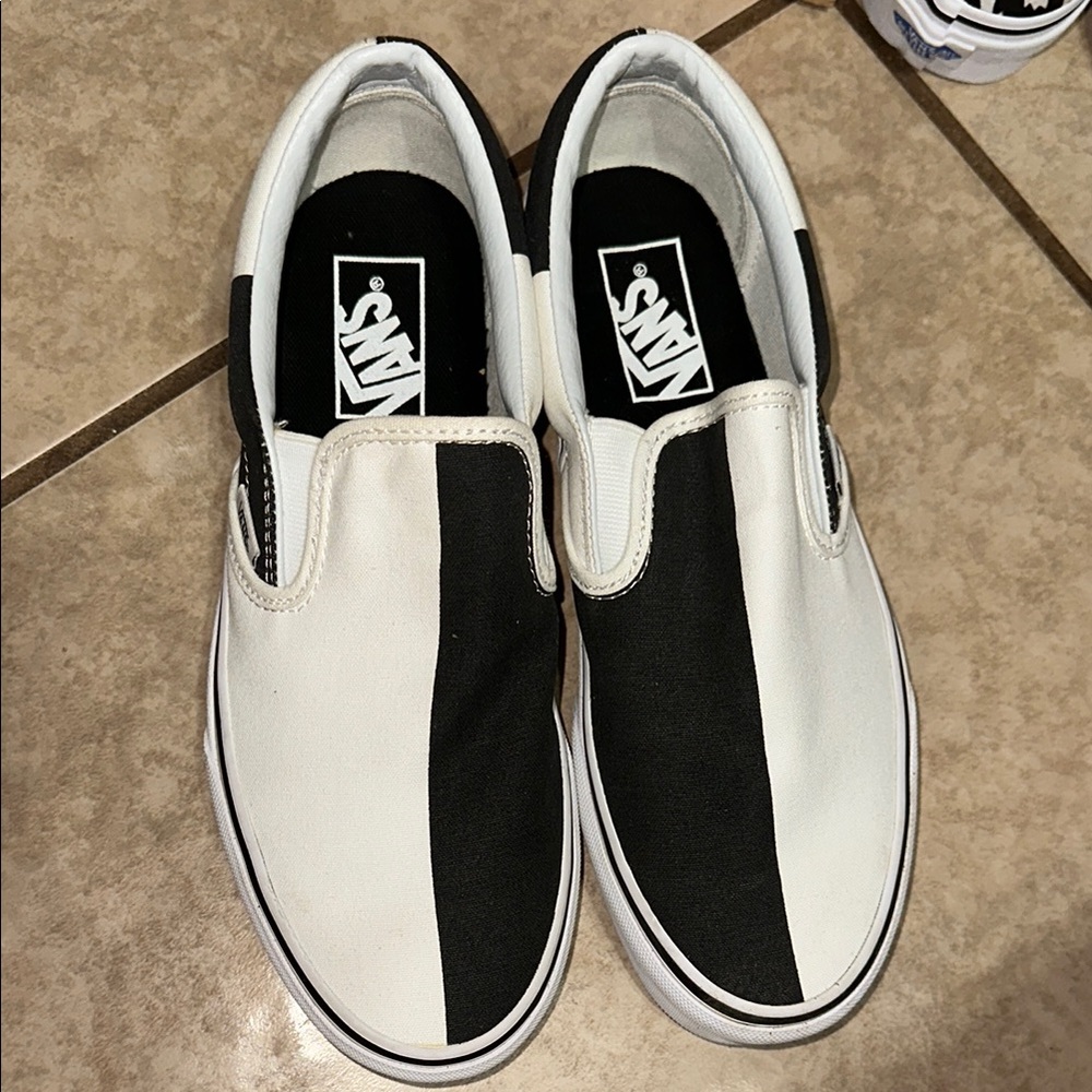 Vans Black and White Classic Slip-On Sneakers